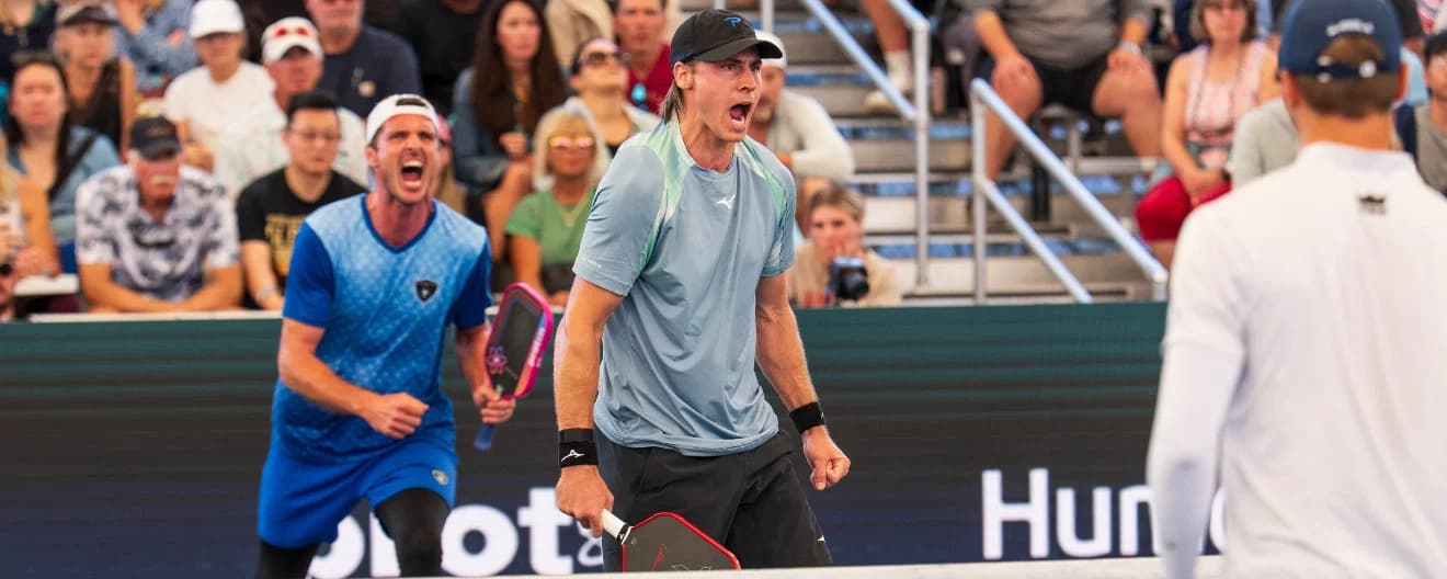 Christian Alshon and Andrei Daescu celebrate their victory.