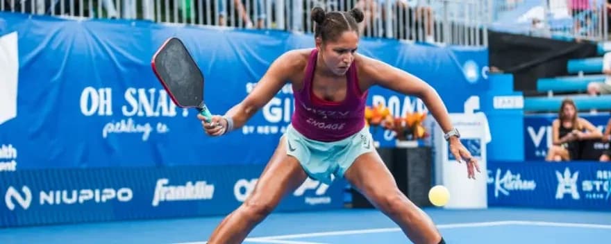 Jessie Irvine hits a forehand.