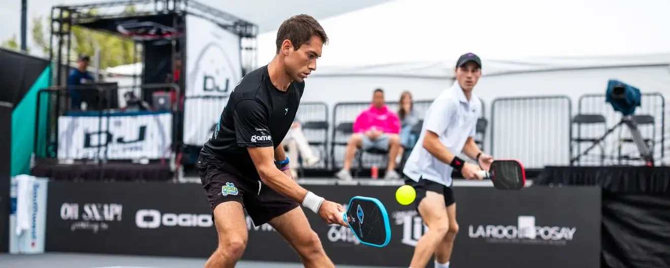 Zane Navratil and Christian Alshon playing pickleball.