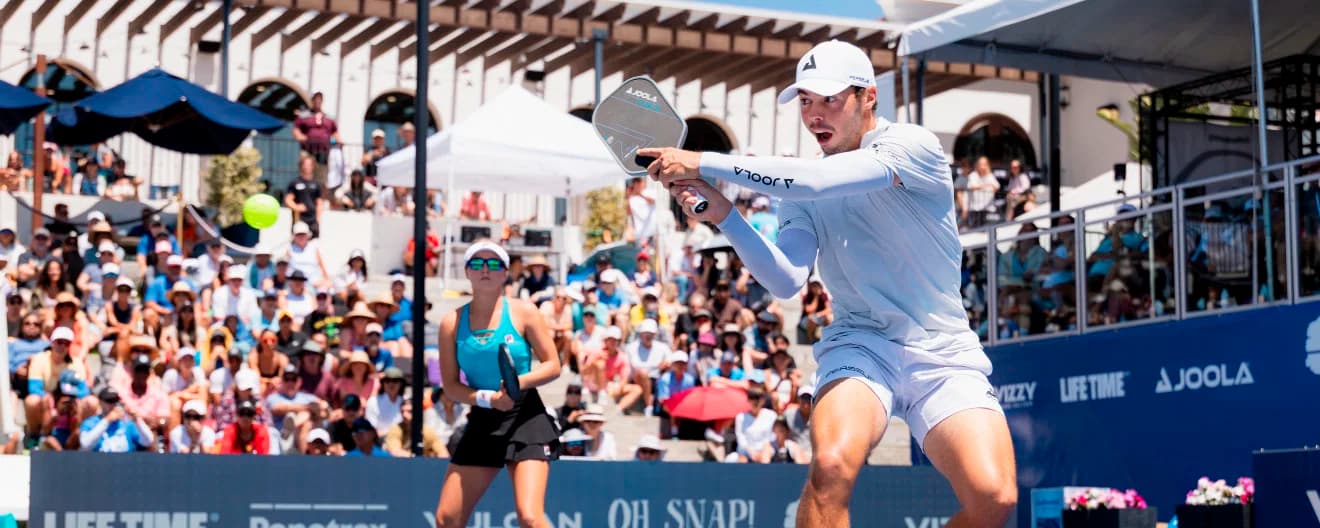 Ben Johns hits a backhand volley.