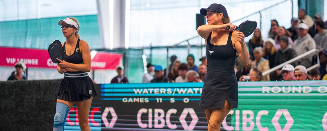 Anna Leigh and Leigh Waters play doubles together as mother-daughter duo.