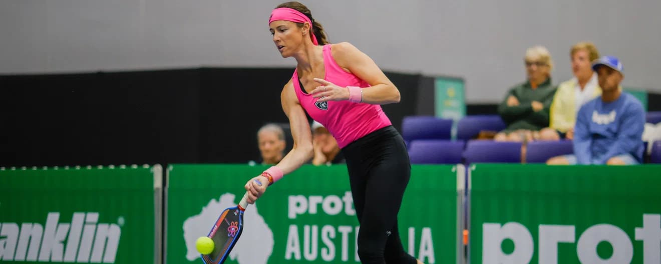 Kaitlyn Christian hits a pickleball forehand.